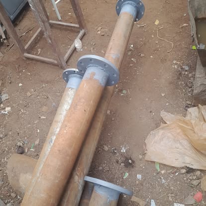 Flanged steel drive pipes prepared for installation